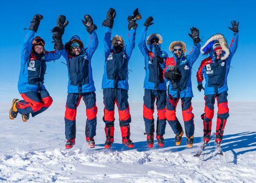 Going with the floe: ING’s Michael Dryden (third from left) and friends celebrate the start of their journey to the South Pole.