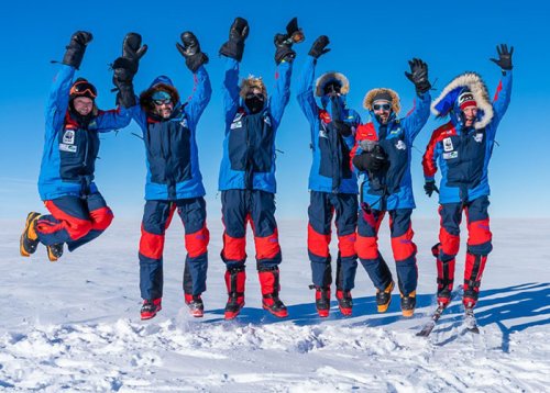 Going with the floe: ING’s Michael Dryden (third from left) and friends celebrate the start of their journey to the South Pole. 