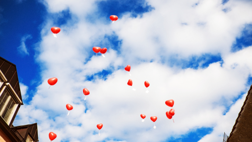 illustration: heart-shaped balloons in the air